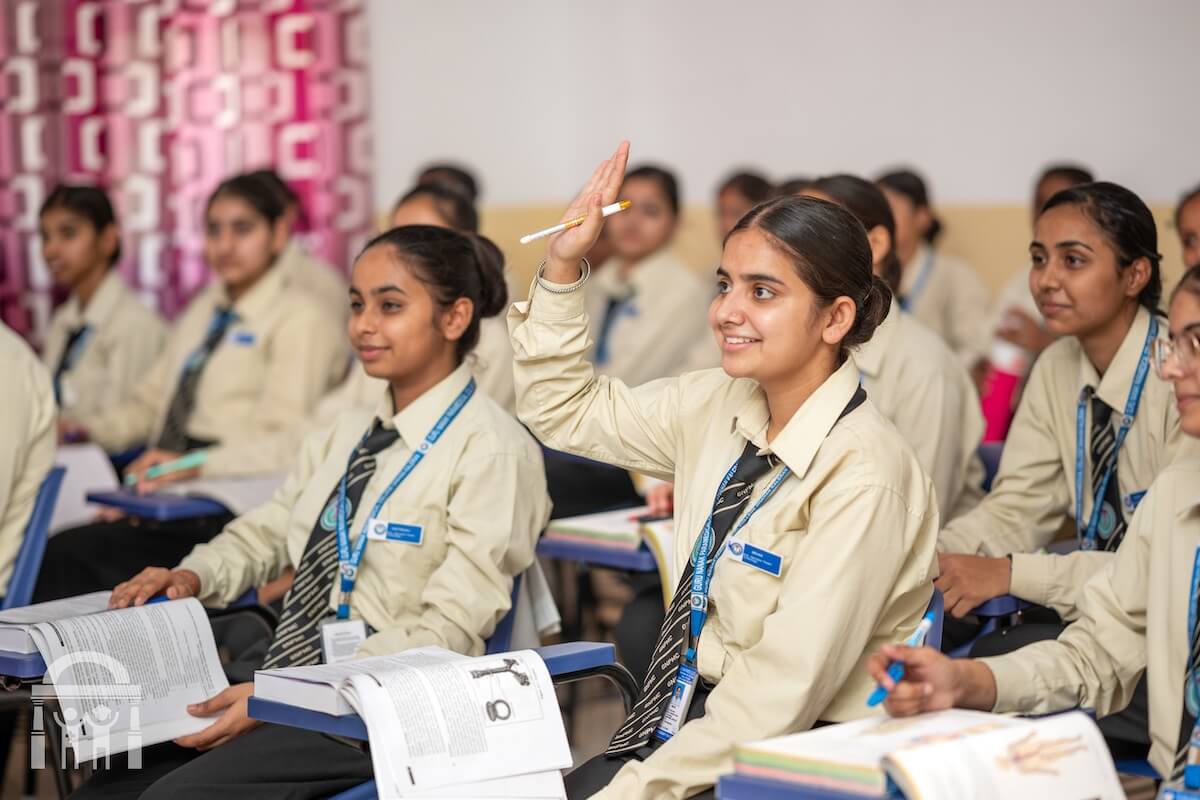 student raising hand in class - Guru Nanak Paramedical College Dhahan Kaleran Punjab