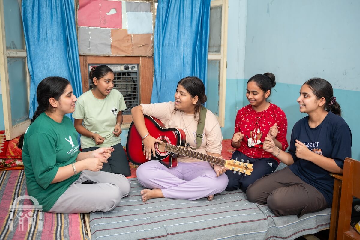 female students singing in hostel at Guru Nanak Paramedical College in Punjab