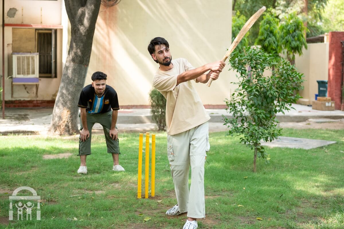 Students playing cricket on campus at paramedical college in Punjab