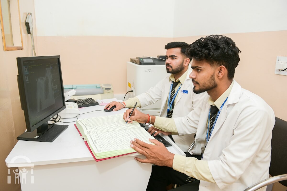 BSc radiology students viewing X-ray screen scan - Guru Nanak Paramedical College Dhahan Kaleran Punjab